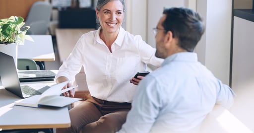 Woman and colleague talking