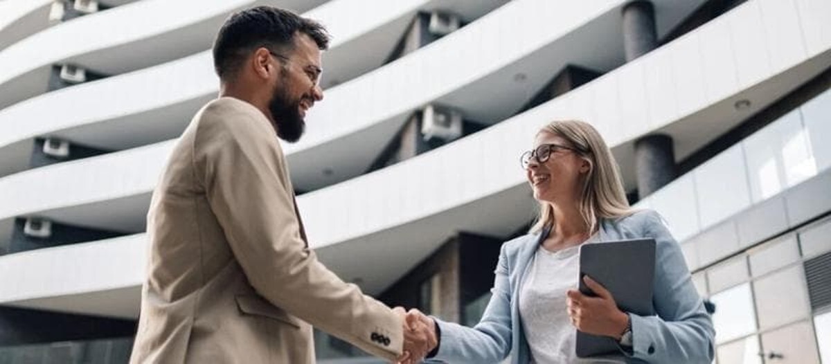 Colleagues shaking hands