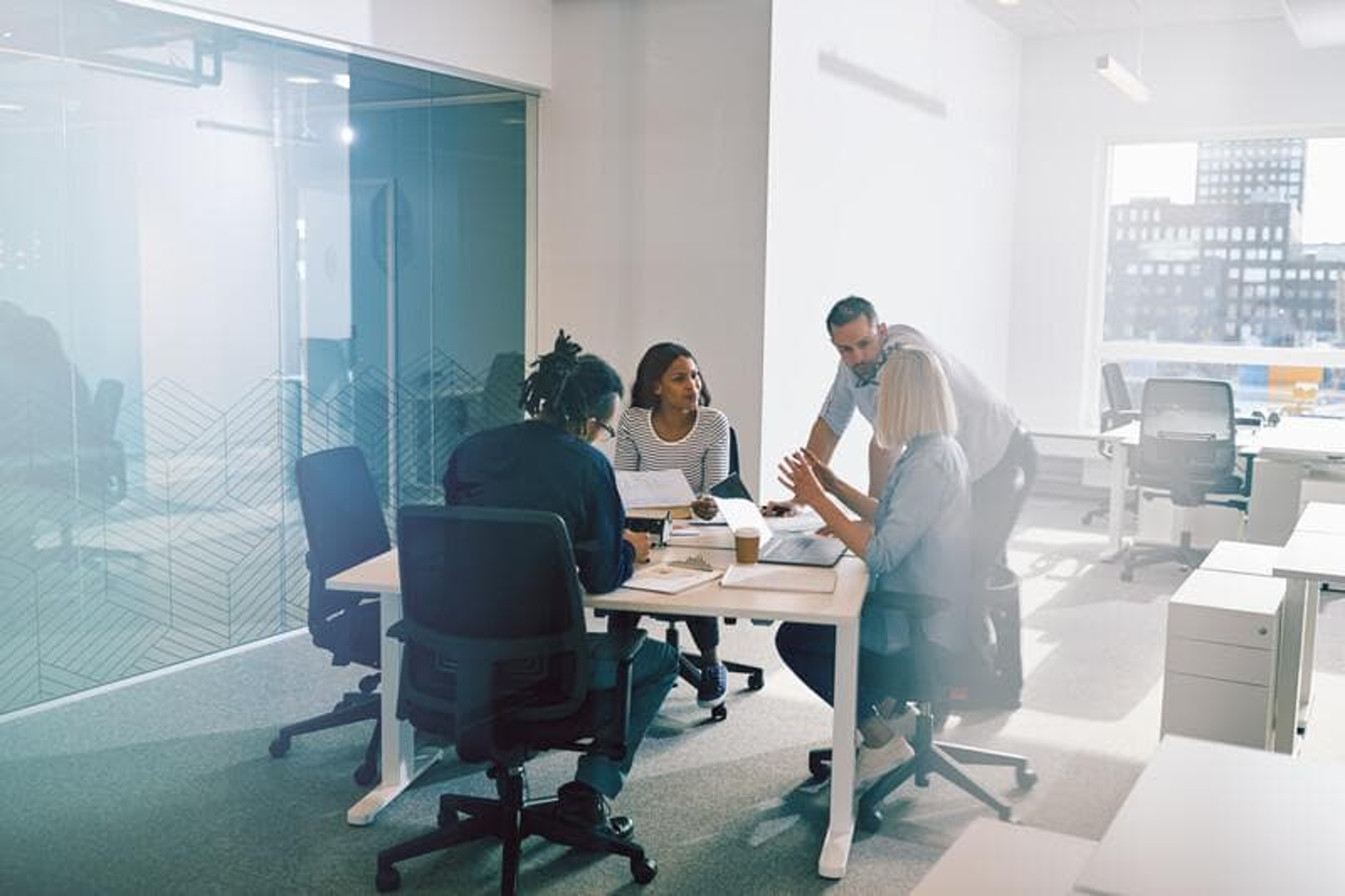 Office workers collaborating