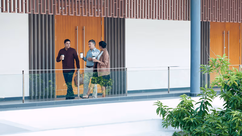 webimage-Successful-business-people-hurrying-to-work-when-drinking-morning-coffee-and-discussing-latest-news (1)