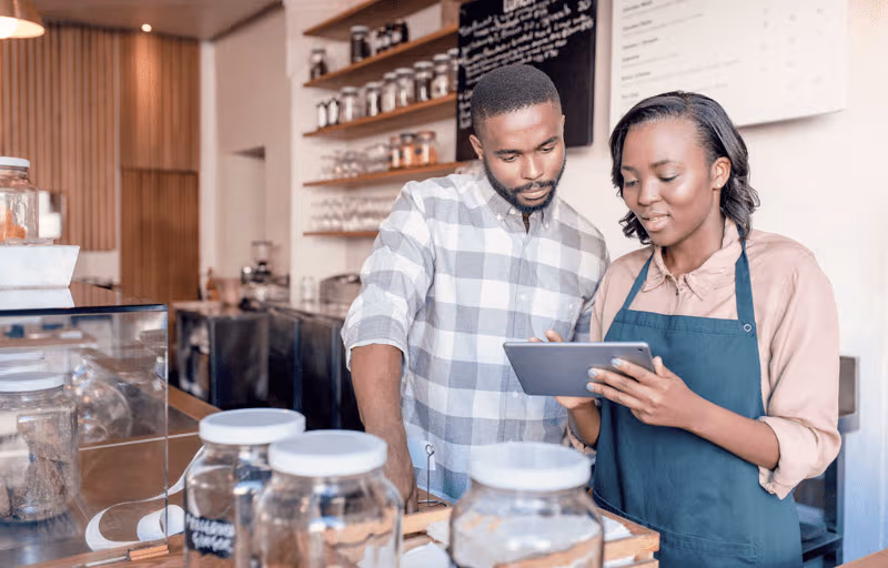 webimage-Two-young-African-entrepreneurs-working-at-their-cafe-counter (1)